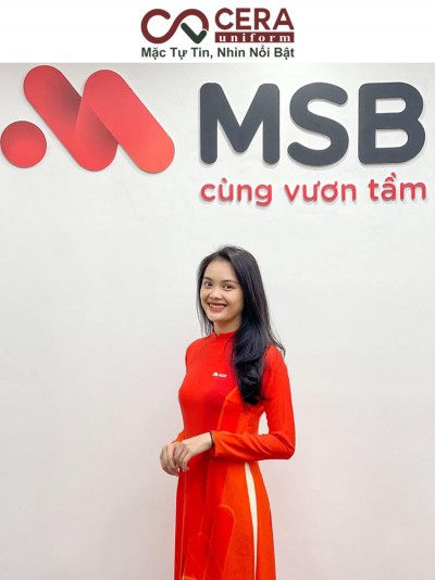 Đồng phục áo dài ngân hàng MSB với sắc cam đỏ tinh tế thumb